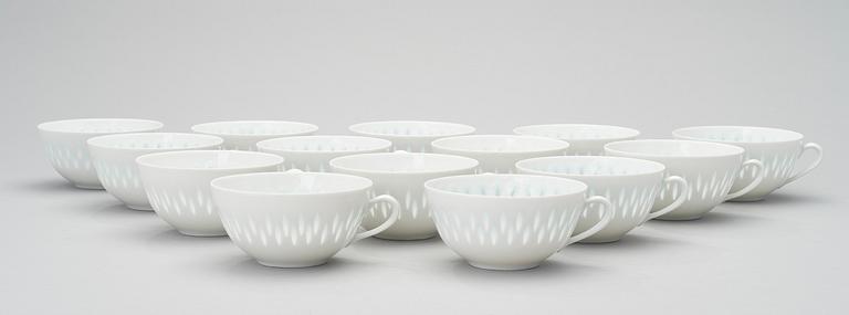 A RICE GRAIN PORCELAIN SET OF TEA CUPS BY FRIEDL HOLZER-KJELLBERG, 18 pcs, signed Arabia F.H-Kj Finland.