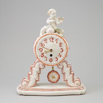 A porcelain mantle clock from Dressel, Kister & Co, Passau, Germany, first half of the 20th Century.