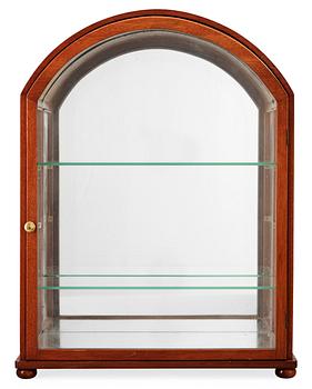 340. A Josef Frank mahogny showcase cabinet by Svenskt Tenn, Stockholm.
