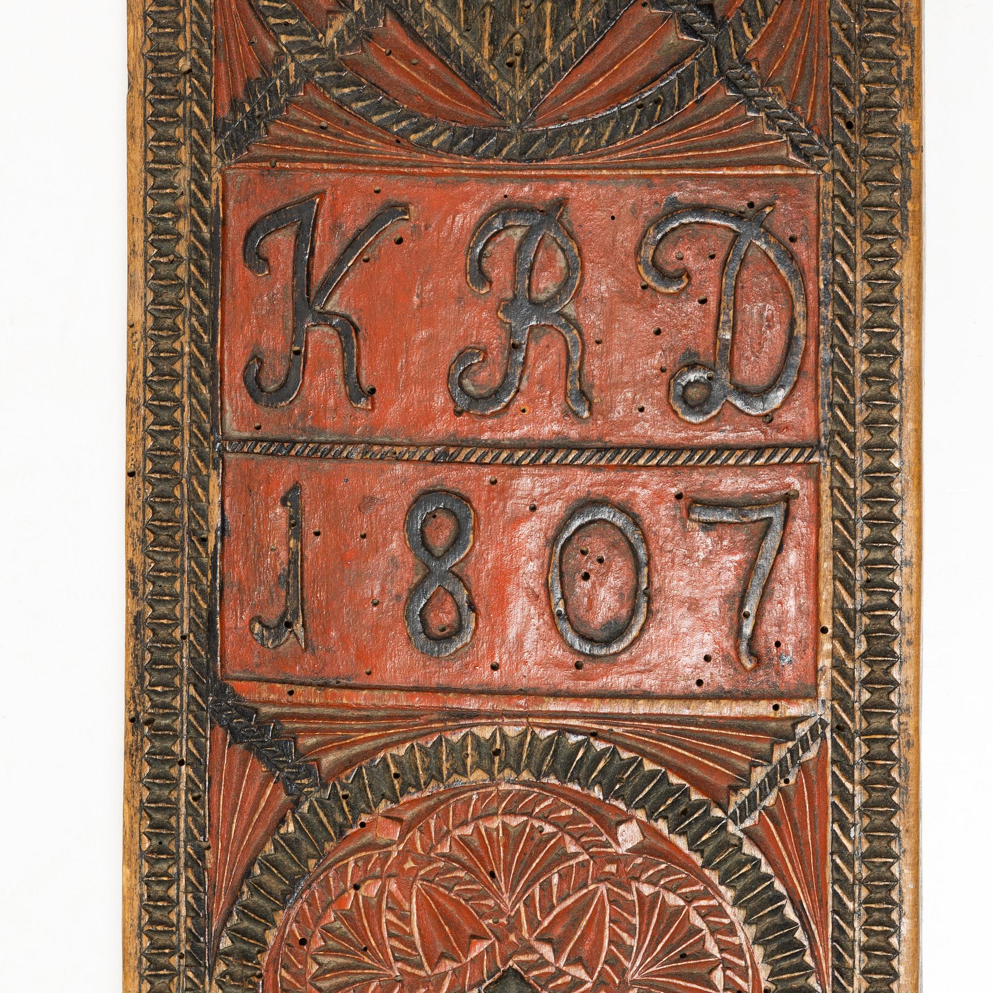 A painted wooden mangle board, Southern Sweden, dated 1807.