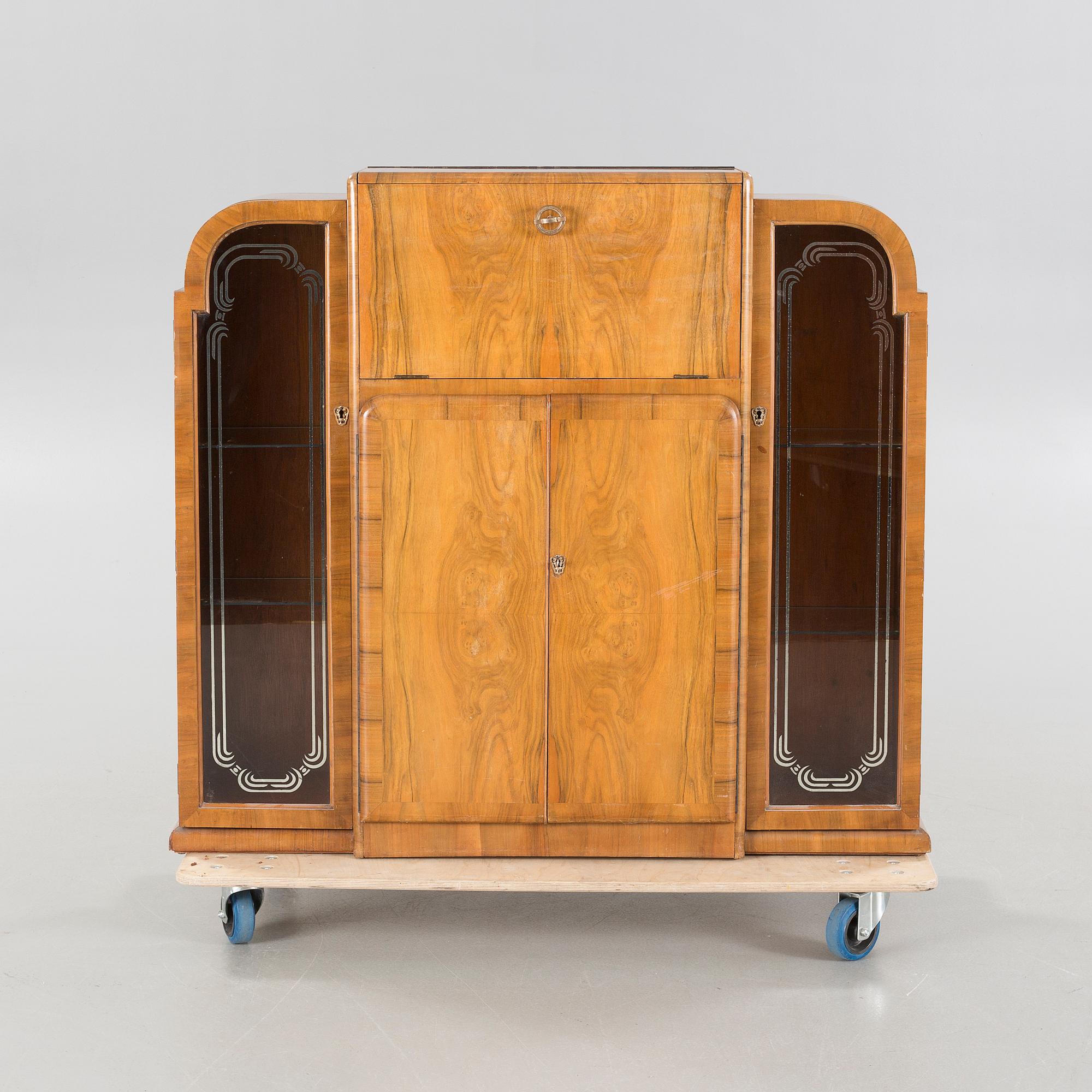 A 1960s "Mayfair" cocktail cabinet by Rivington, England.