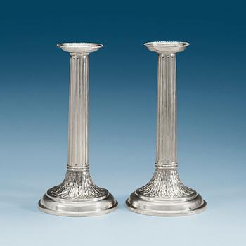 A pair of German 18th century silver candlesticks, unidentified makers mark FS, Hamburg mark of J. von Holten I 1772-90.