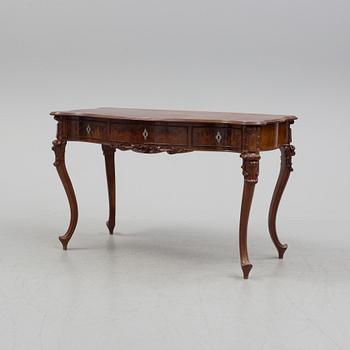 a neo rococo desk from the late 19th century.