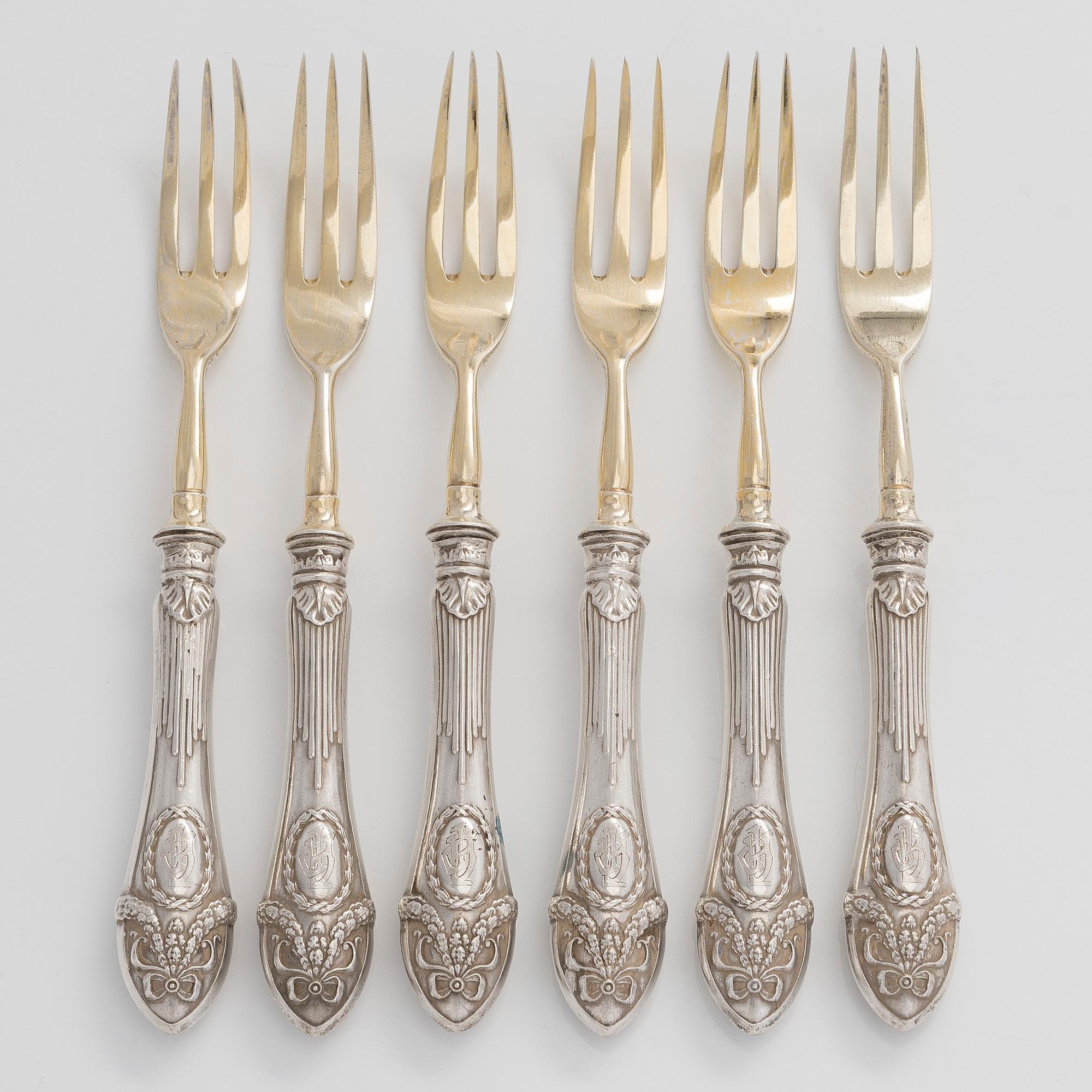 A set of six parcel-gilt forks, maker's mark of Mihail Bogdanov, Saint Petersburg 1892-1912.