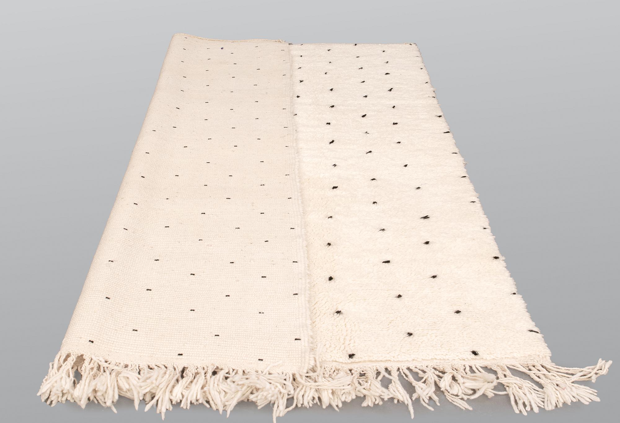 A Moroccan carpet, 254 x 160 cm.