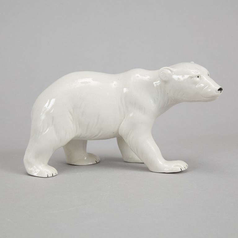 Five ceramic polar bears.