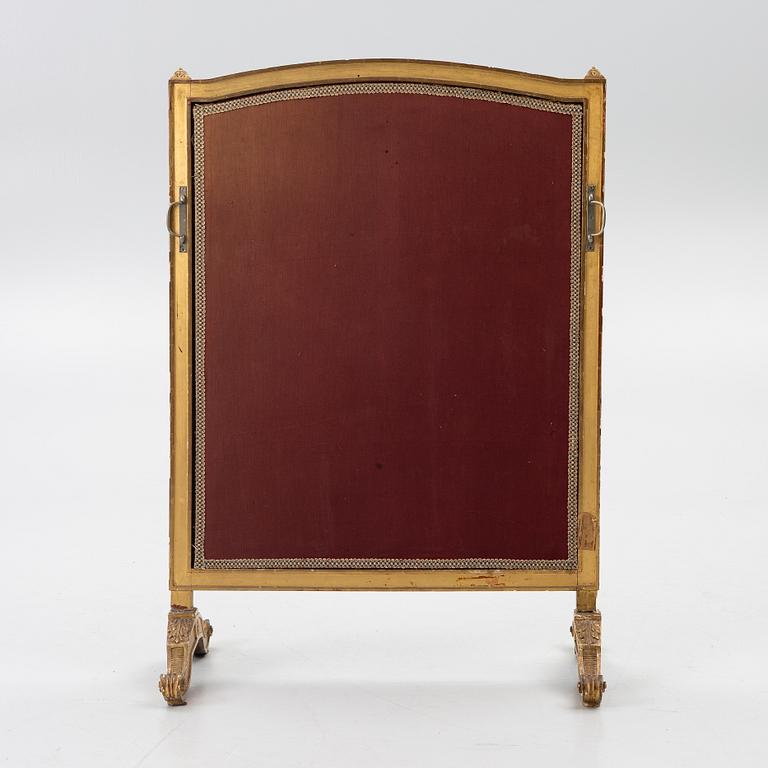 A Louix XVI-style fire guard, late 19th century.