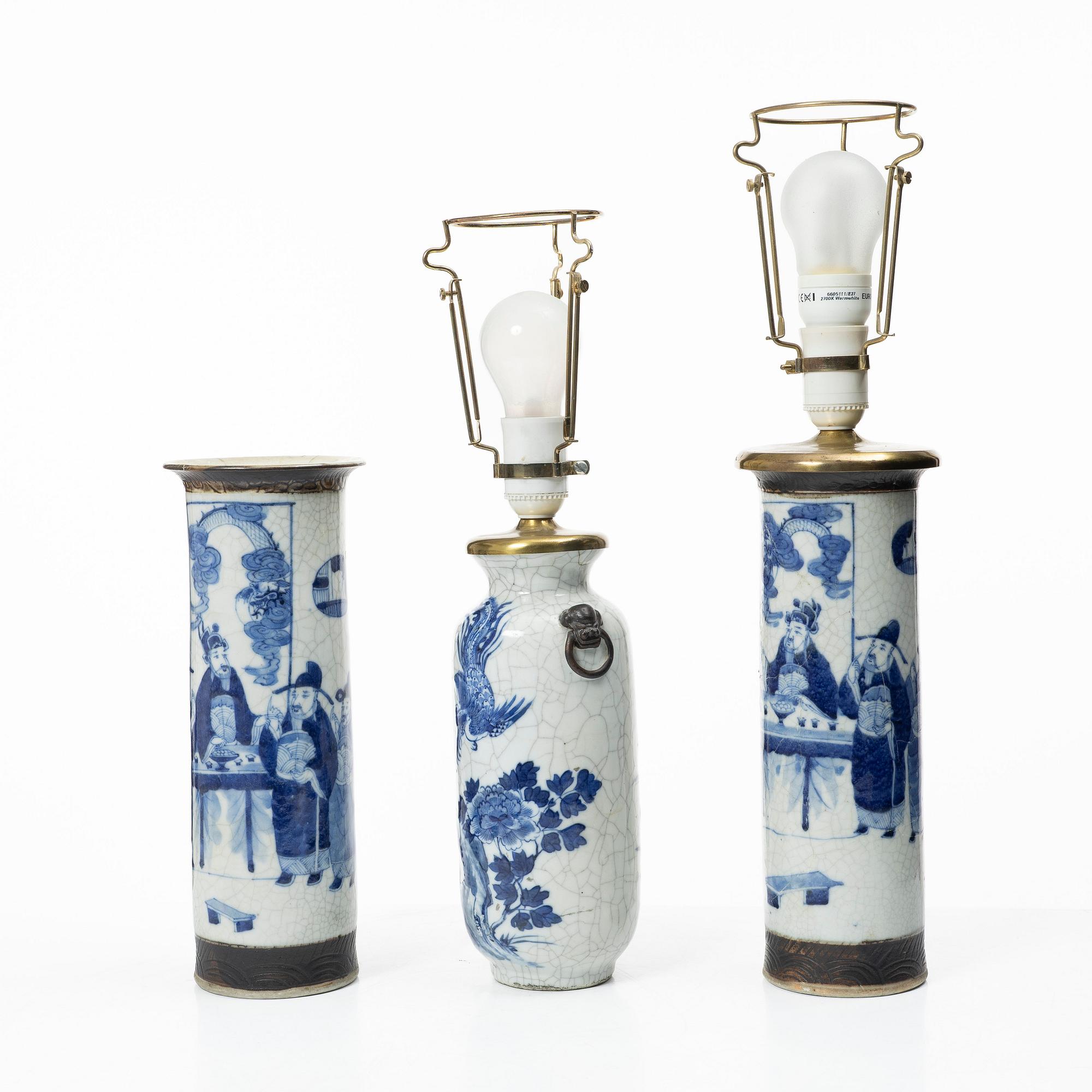 A group of three Chinese porcelain vases, two of them converted into table lamps, around 1900.