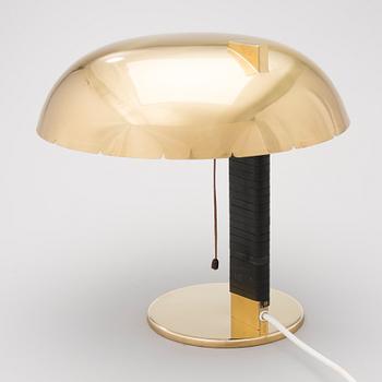 A mid 20th century '9228' table lamp for Idman Finland.