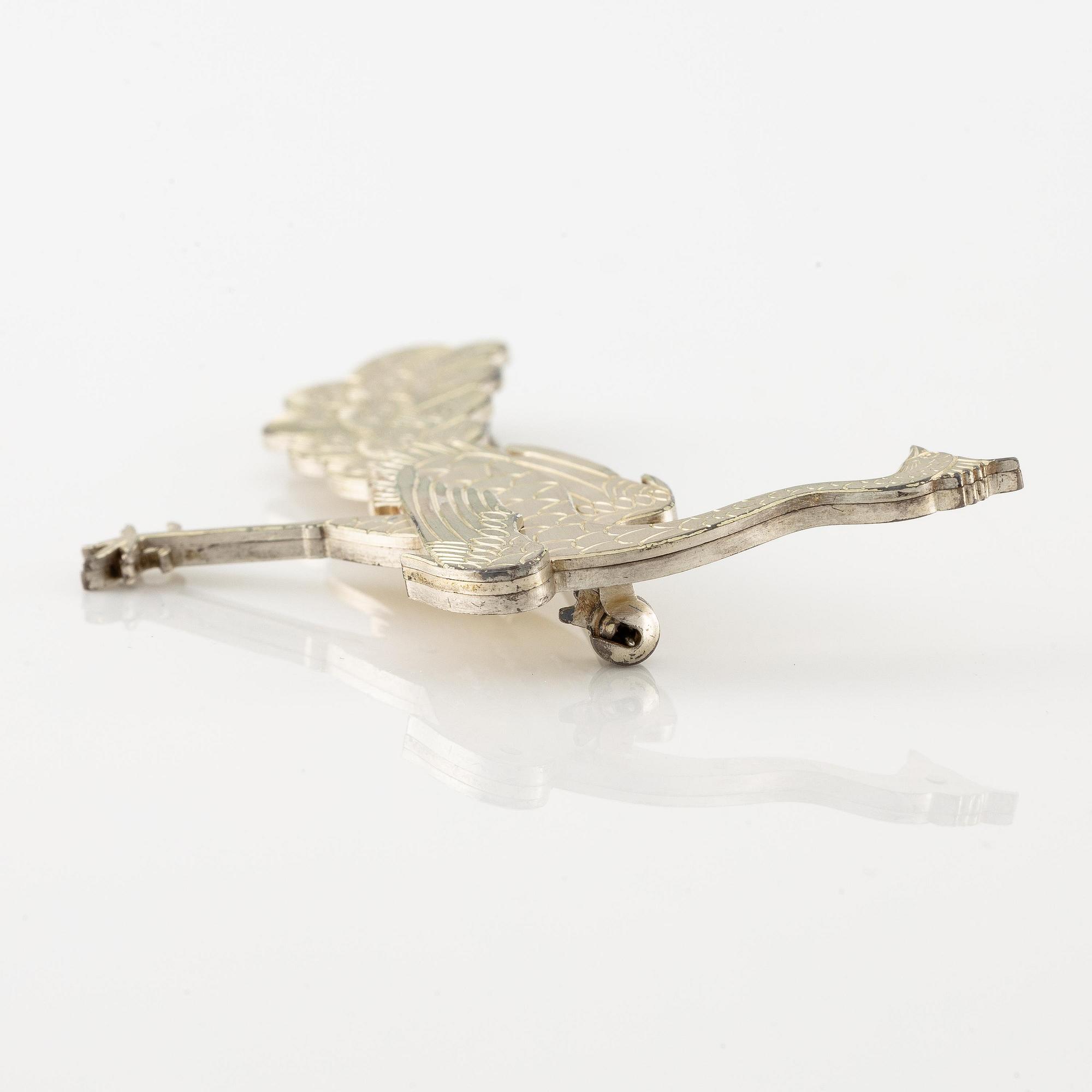 Wiwen Nilsson, a brooch, sterling silver, in the form of a peacock, Lund 1959.