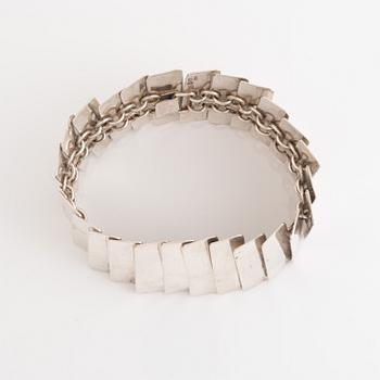 Silver bracelet.