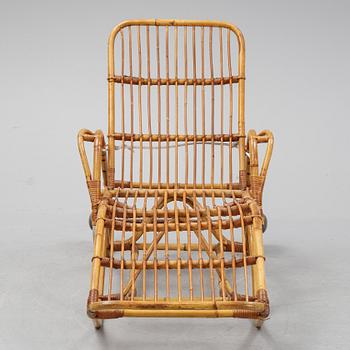 A rattan lounge chair.