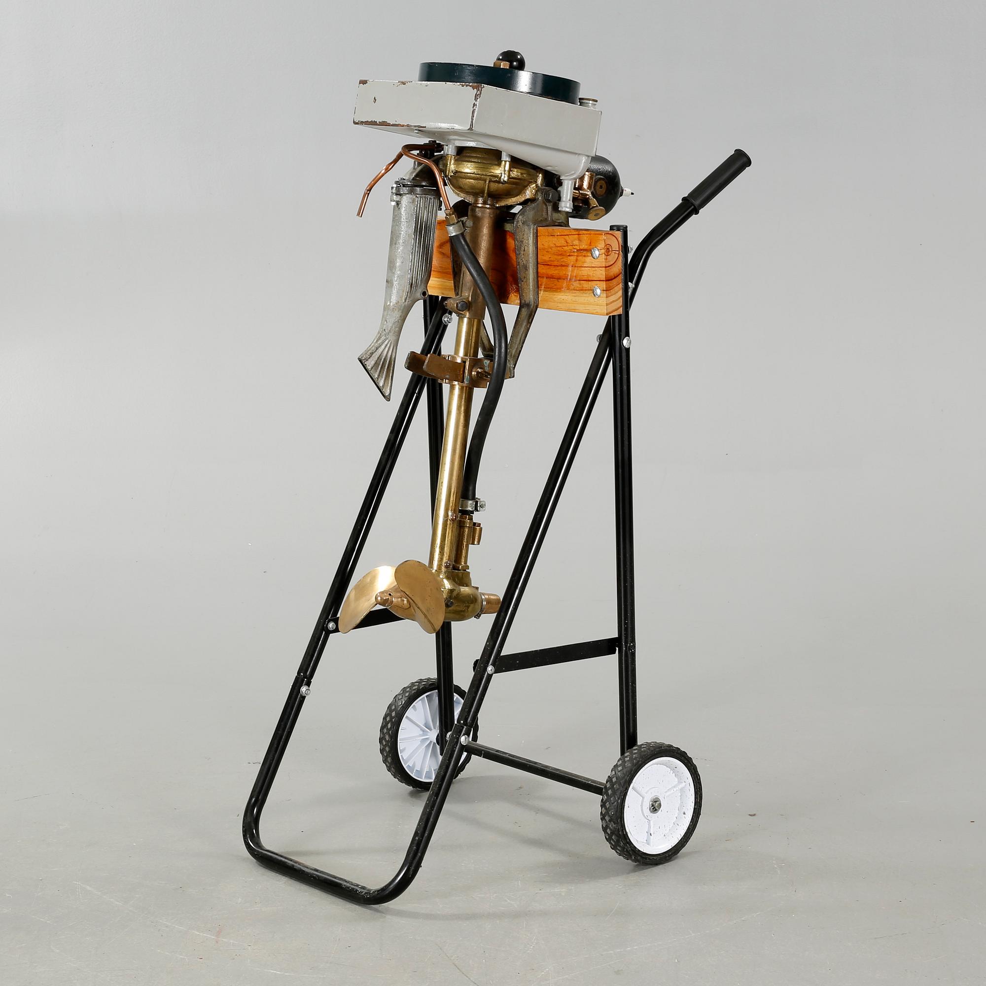 An early 20th century rowboat motor 
by Evinrude Detachable Rowboat Motor Company,
Milwaukee in Wisconsin.