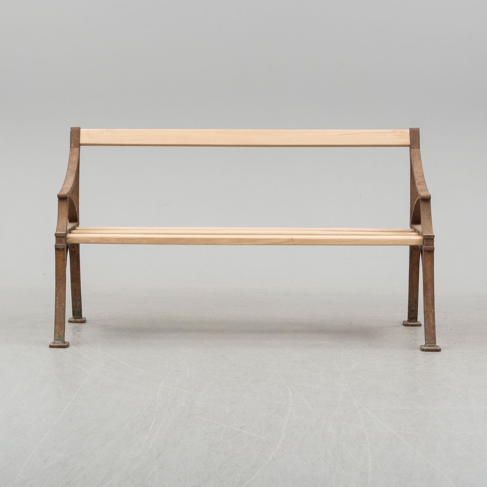 A late 19th century garden sofa by Byarum.