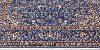 A Kashmar carpet, 408 x 307 cm.