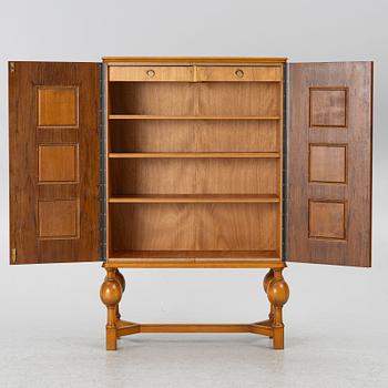 Eugen Höglund, a walnut cabinet, executed in his workshop in Vetlanda, Sweden 1950s.