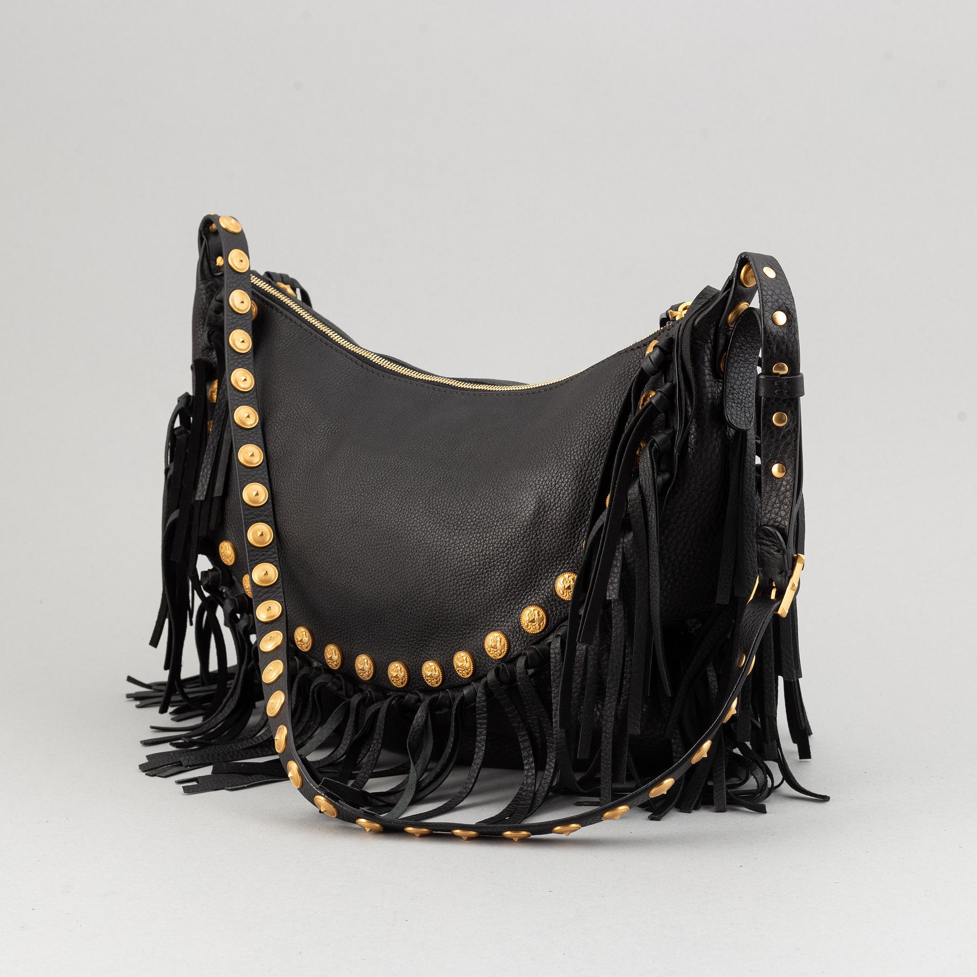 Valentino, a black leather hobo bag.
