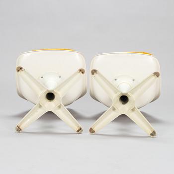 Set of 8 vintage swivel chairs model 115 and a table by Maurice Burke for Arkana, United Kingdom, 1960s.