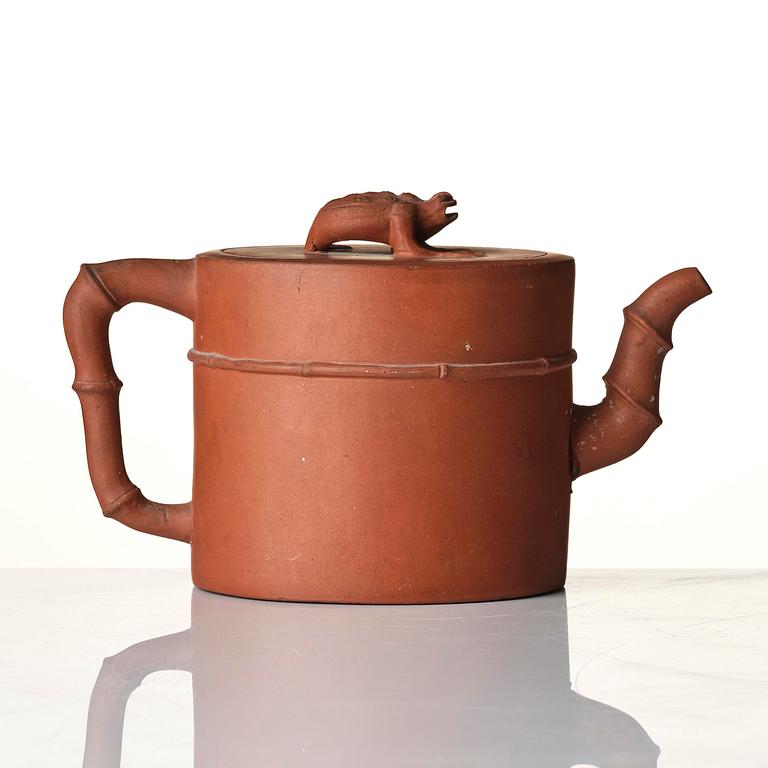 An yixing 'toad' tea pot with cover, Qing dynasty, 18th century.