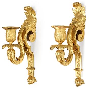 1009. A pair of Louis XVI-style late 19th century one-light wall-lights.