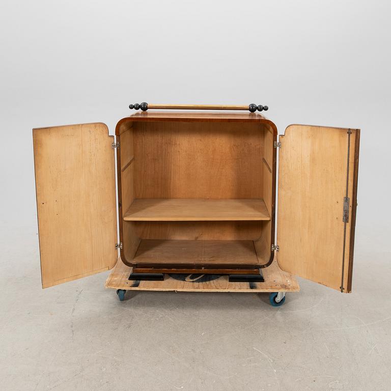 A walnut veneered Art Déco cabinet.