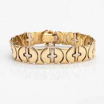 A 14K white and yellow gold bracelet.
