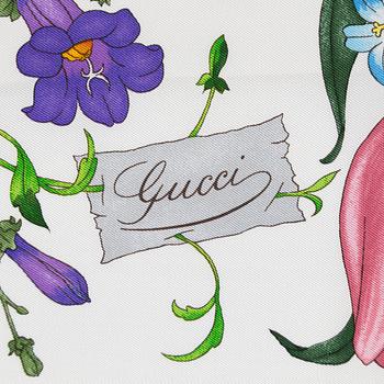 Gucci, a 'Flora' silk scarf.