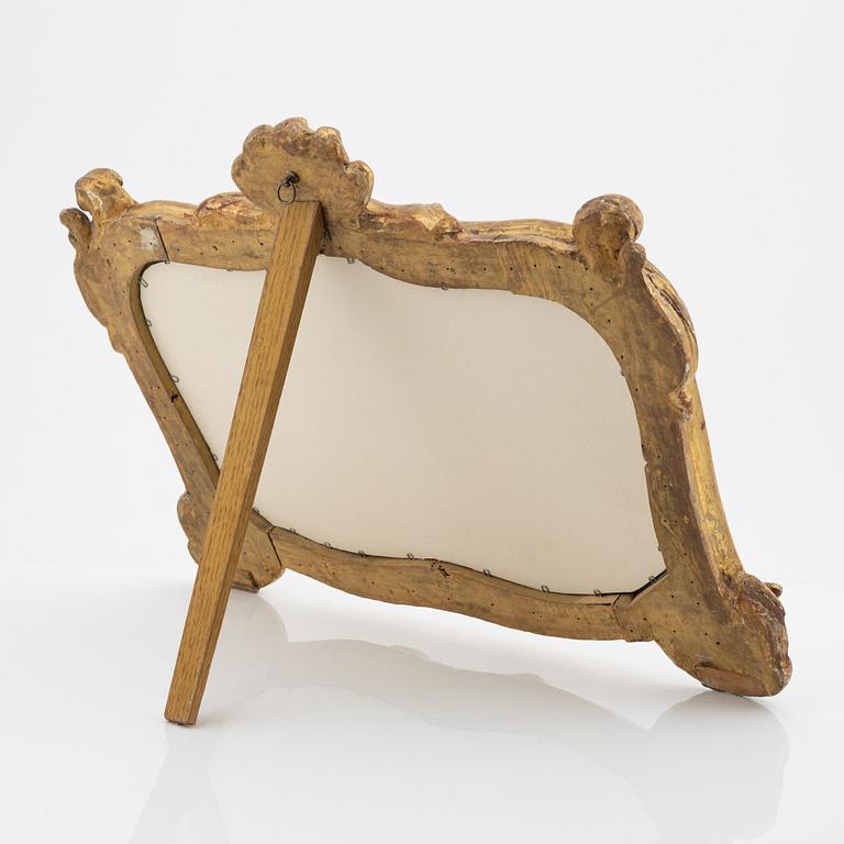 A gesso Louis XV-style toilette mirror, 20th Century.