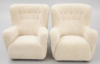 A pair of Danish Modern sheepskin armchairs, 1930's/40's.