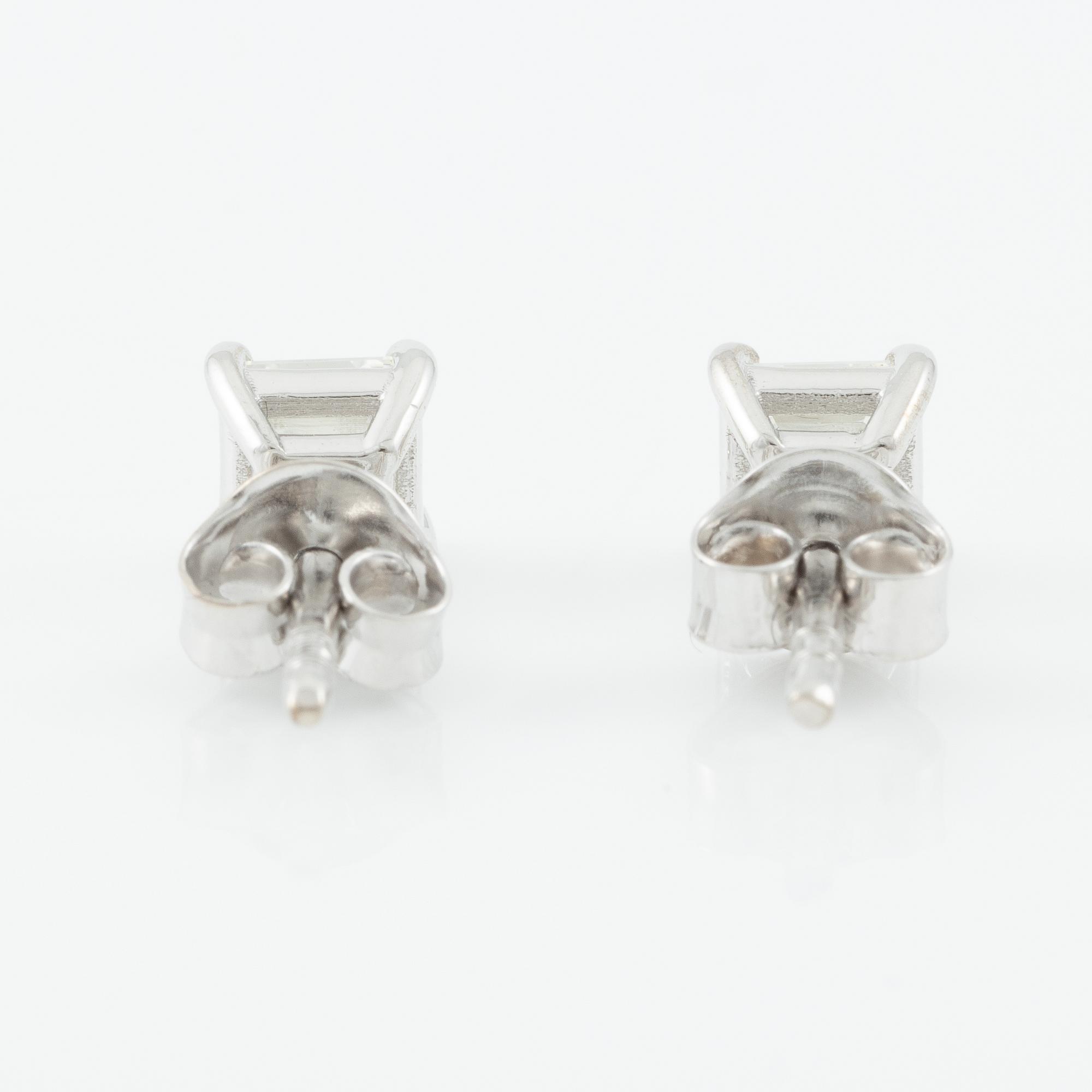 Earrings, a pair, 18K white gold with emerald-cut diamonds, accompanying GIA dossier.