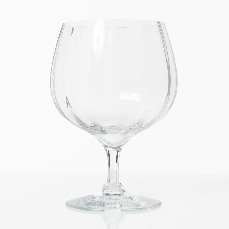 A set of 46 glass service parts, including 'Elixir Connoisseur' and Gunnar Cyrén, 'Optica', Orrefors.
