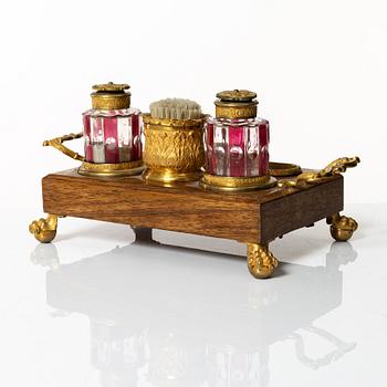 A French late Empire ormolu and cut-glass writing stand, ca 1830.