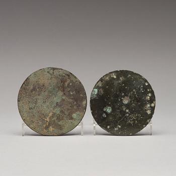 Two bronze mirrors, Tang dynasty (618-907).