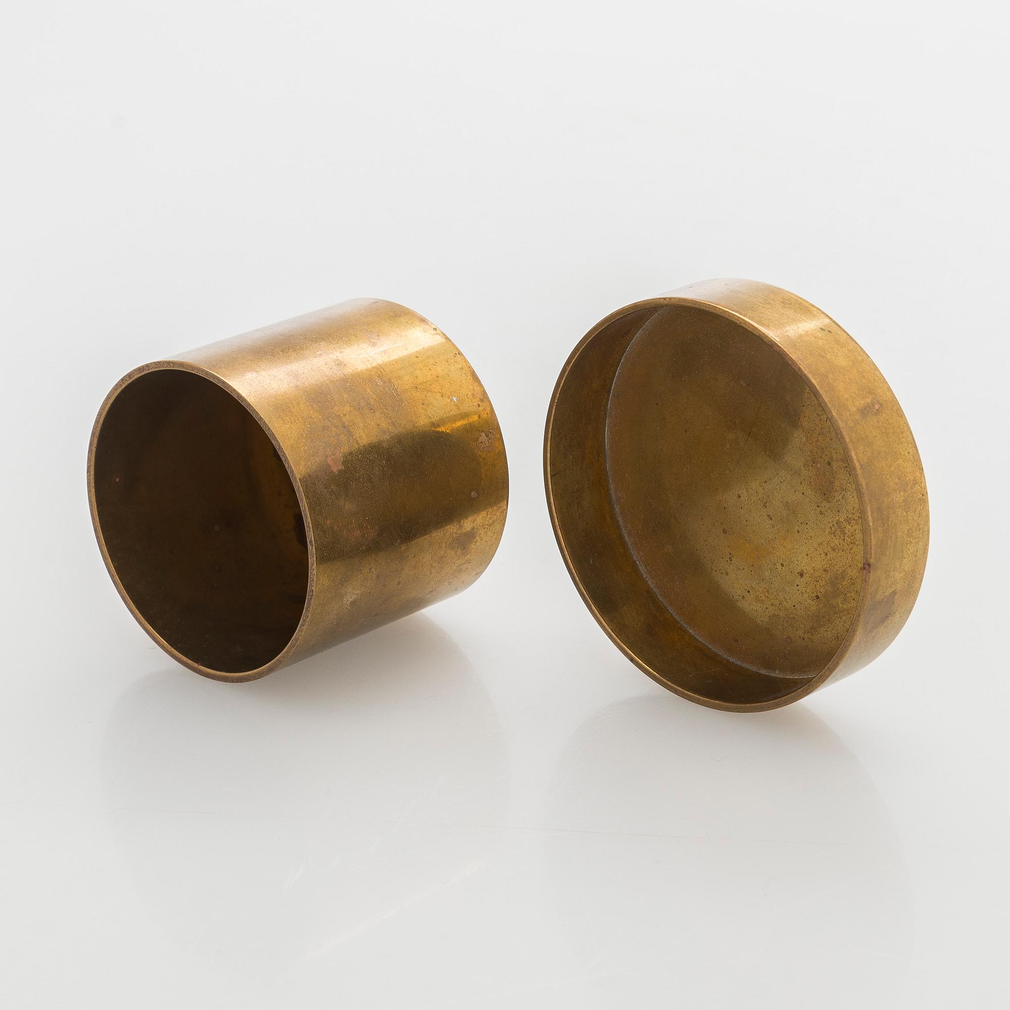 Maija Heikinheimo, a set of two mid-20th century brass jars, manufacturer Valaistustyö for Artek.