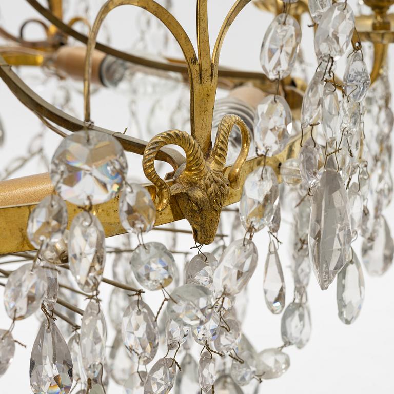 A Gustavian style chandelier with older parts, late 18th and 20th century.