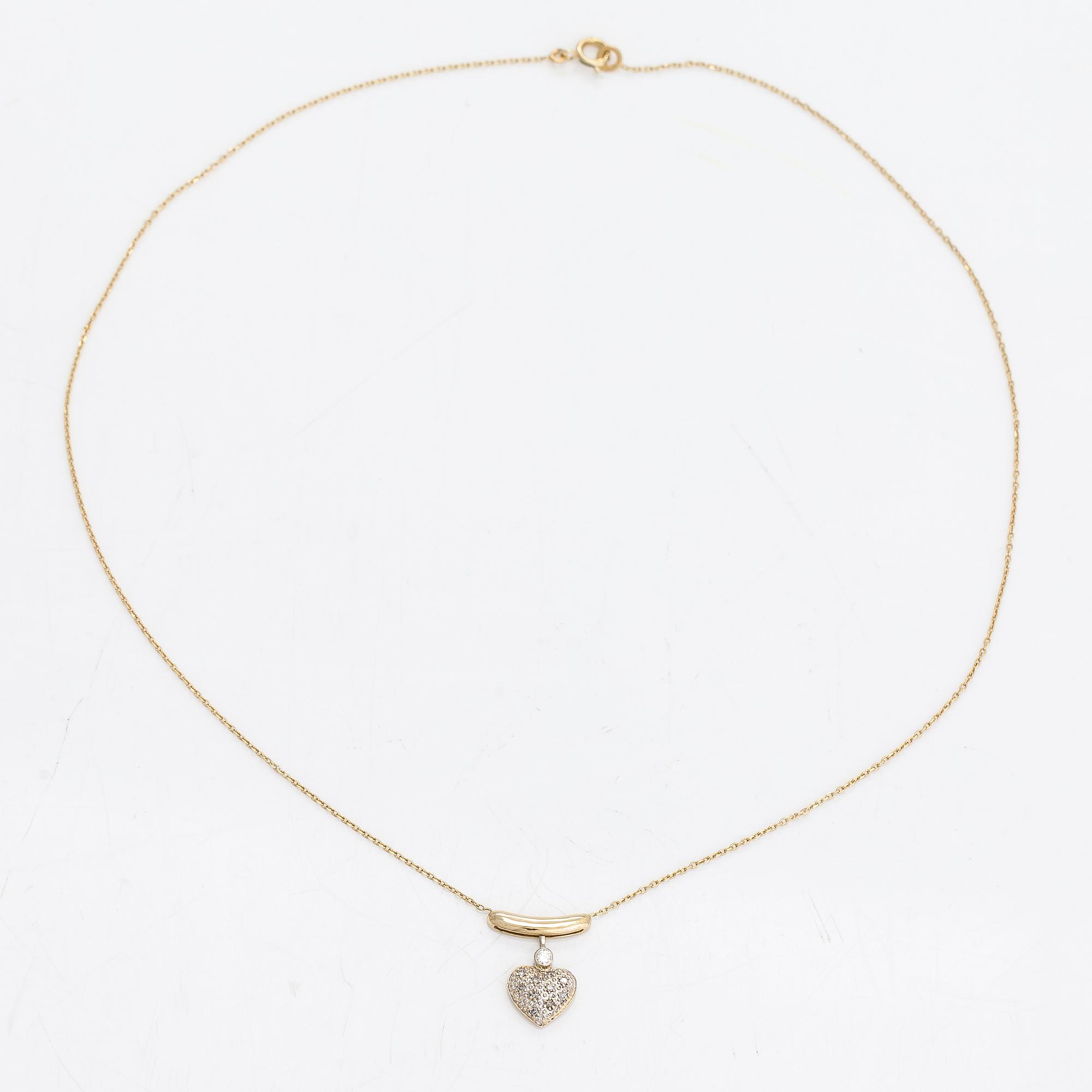 A 14K gold necklace with diamonds ca. 0.08 ct in total.