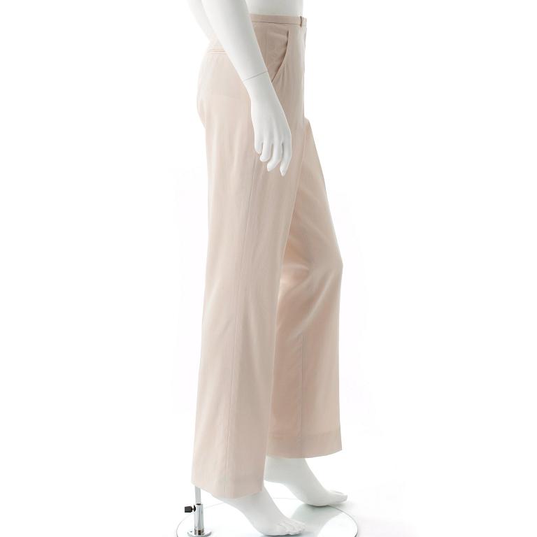 HERMÈS, a pair of creme colored silk pants.