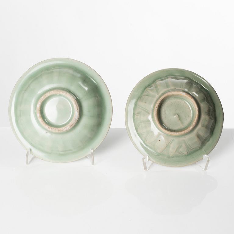 Two celadon glazed double fish dishes, Ming dynasty (1368-1644).