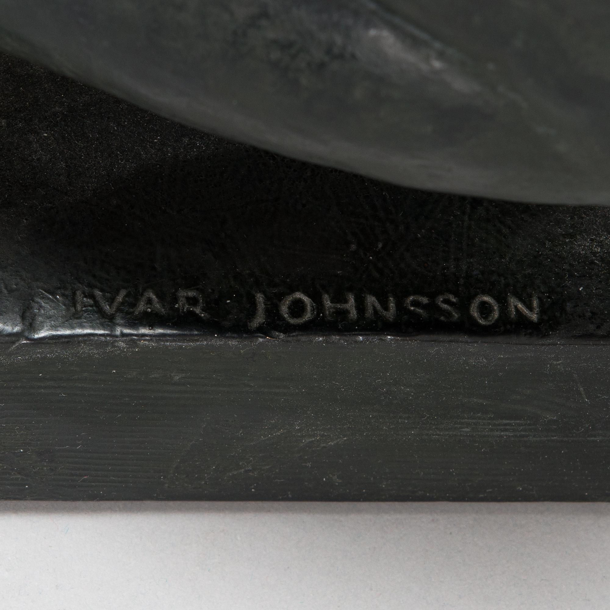 Ivar Johnsson, a painted plaster sculpture, signed.