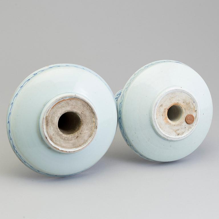 A large pair of Chinese blue and white porcelain incense holders/candle holders, Qing dynasty, 19th century.