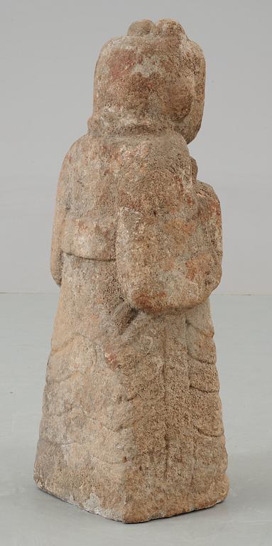 A stone sculpture of a guardian, presumably Han dynasty.