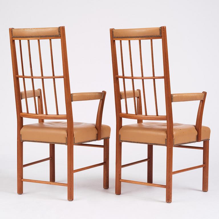 Josef Frank, a pair of mid-Century mahogany chairs, Svenskt Tenn Sweden, model nr 652.