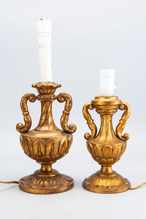 A set of four wood table lamps  from Paoletti, Firenze Italy, second half of 20th century.