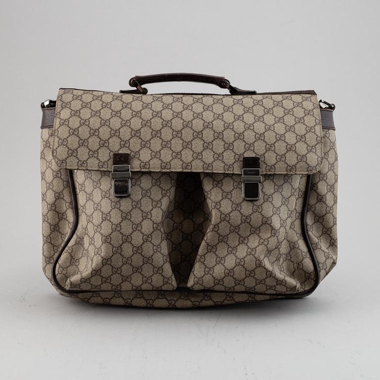Gucci, a messenger bag.