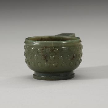 A Chinese archaistic carved nephrite cup.