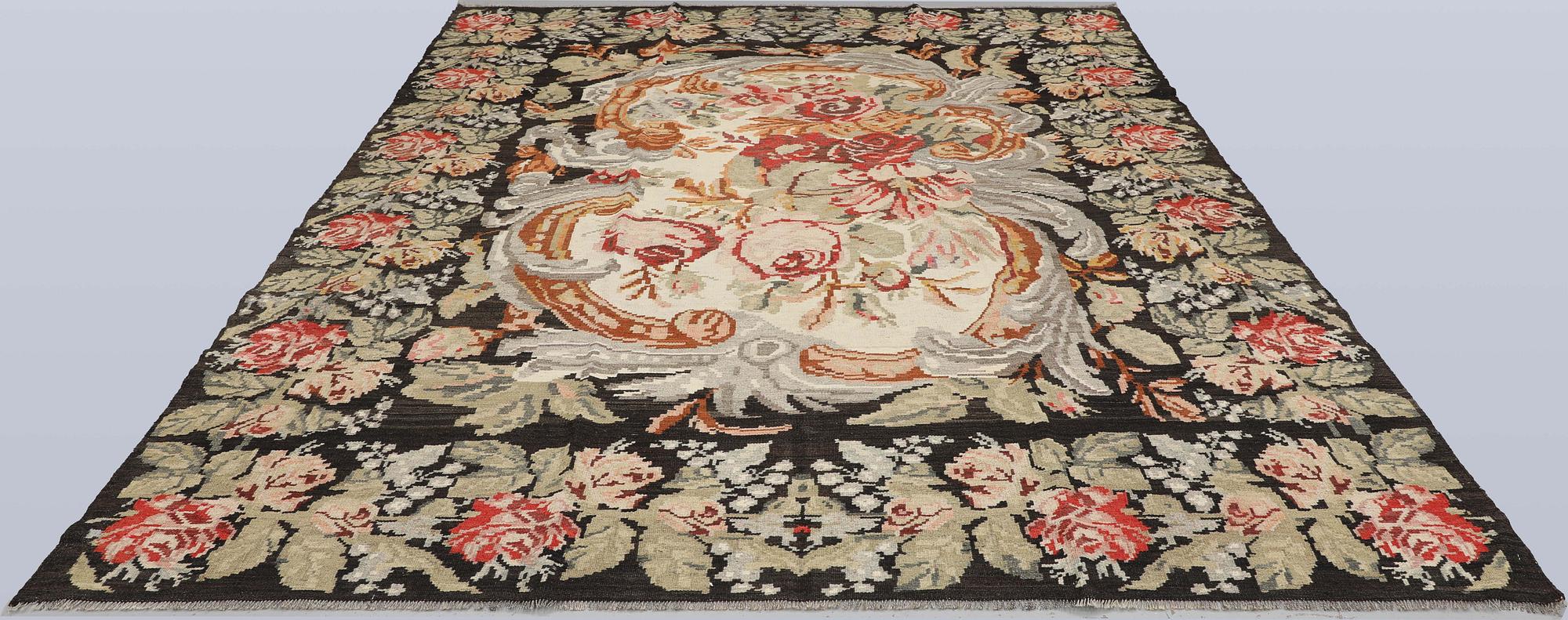 An older Bessarabian Kelim carpet, 287 x 220 cm.