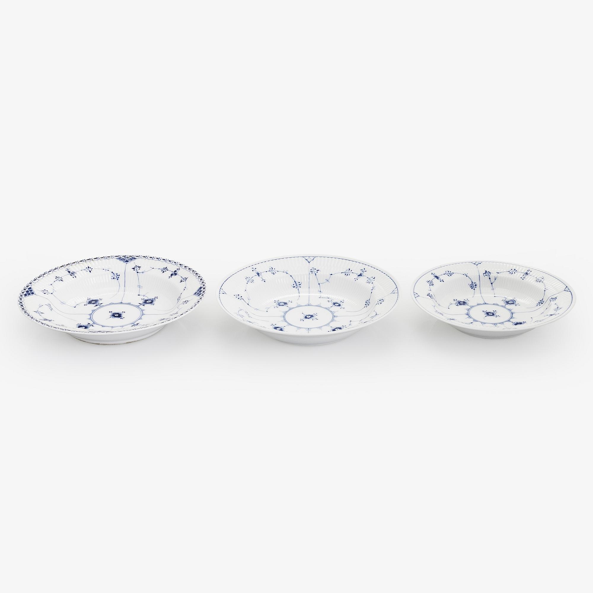 An 8-piece porcelain "Musselmalet", Royal Copenhagen, Denmark.