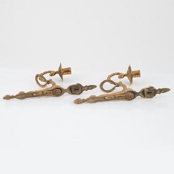 A pair of 'Törne' brass one-light wall ligths from IKEA's 18th Century collection.