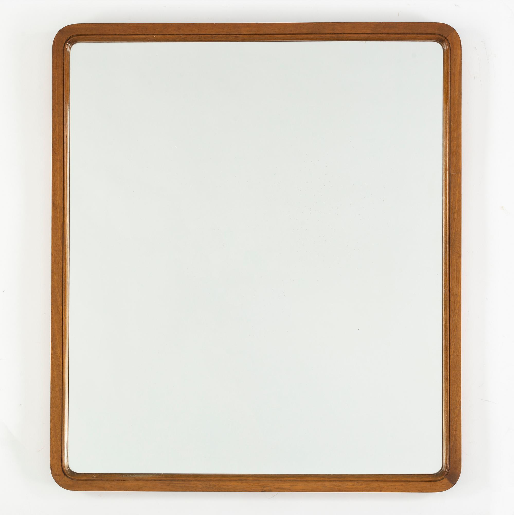 A 1940s Swedish Modern mirror.