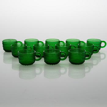 A set of 12 punch cups in glass "Kastehelmi" by Oiva Toikka, Arabia. Finland.